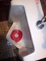 urinal soap holder advising 'say no to drugs'