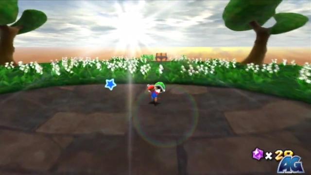 Mario at the top of the slope. The camera has tilted down, revealing a treasure chest in a grassy field with flowers, illuminated by a brilliant sunrise. (This photo comes from a different video, so the player is Mario.)